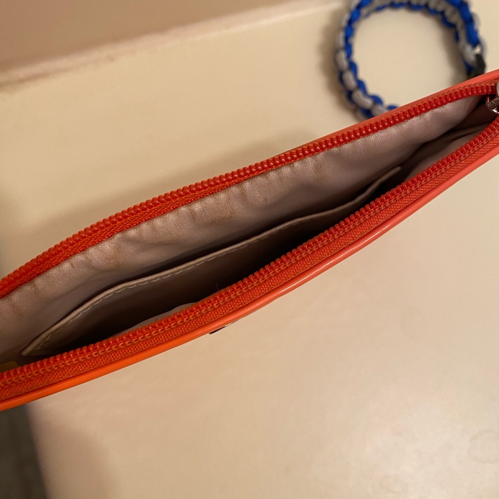 Orange coach wristlet